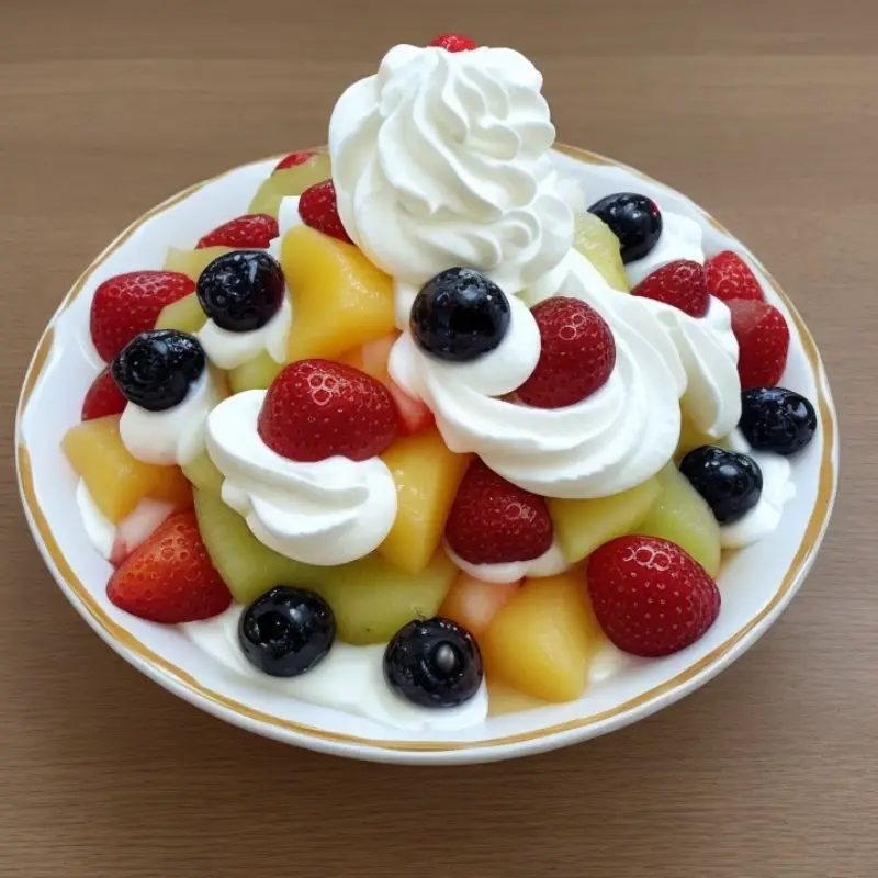 Simple fruit salad with whipped cream and condensed milk