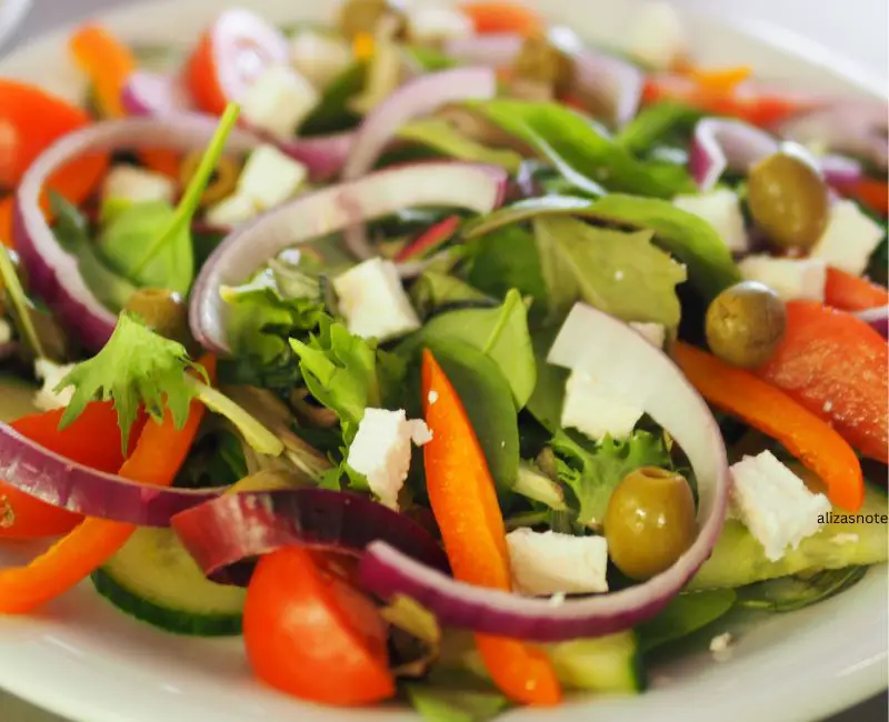 Salad With Tomatoes Cucumbers And Onions